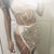 AKYZO 2017 Luxury Rhinestone Chain Alloy Skirt Women A Line Sexy Nightclub Handmade Shining Open Fork Package Hip Mini Skirts